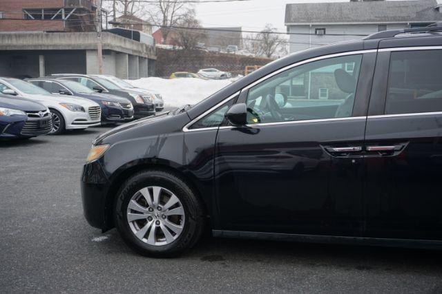 2015 Crystal Black Pearl /Gray Honda Odyssey EX-L (5FNRL5H60FB) with an 3.5L V-6 i-VTEC variable valve control engine, located at 312 Centre Ave, Schuylkill Haven, PA, 17972, (570) 593-5278, 40.638130, -76.177383 - Photo#1