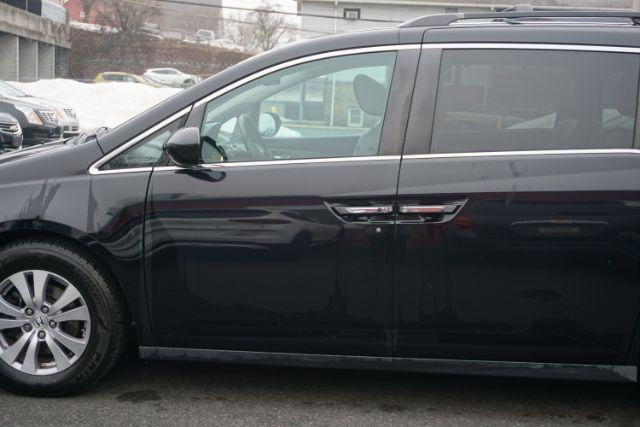 2015 Crystal Black Pearl /Gray Honda Odyssey EX-L (5FNRL5H60FB) with an 3.5L V-6 i-VTEC variable valve control engine, located at 312 Centre Ave, Schuylkill Haven, PA, 17972, (570) 593-5278, 40.638130, -76.177383 - Photo#4