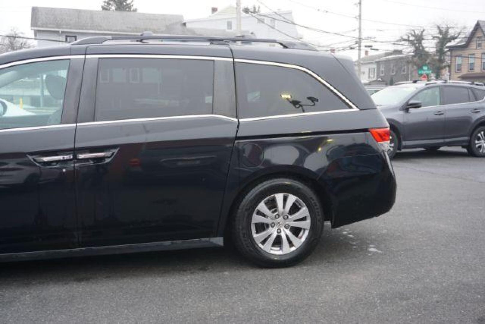 2015 Crystal Black Pearl /Gray Honda Odyssey EX-L (5FNRL5H60FB) with an 3.5L V-6 i-VTEC variable valve control engine, located at 312 Centre Ave, Schuylkill Haven, PA, 17972, (570) 593-5278, 40.638130, -76.177383 - Photo#5