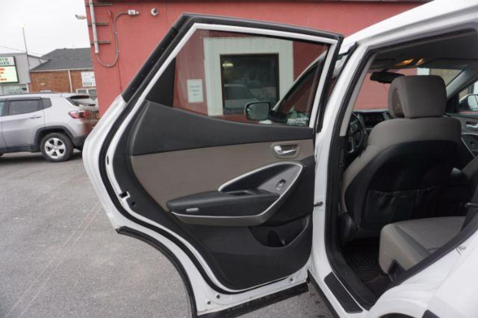 2014 Frost White Pearl /Gray Hyundai Santa Fe Sport 2.4L (5XYZTDLB5EG) with an Theta II 2.4L I-4 gasoline direct injection engine, located at 312 Centre Ave, Schuylkill Haven, PA, 17972, (570) 593-5278, 40.638130, -76.177383 - Photo#40