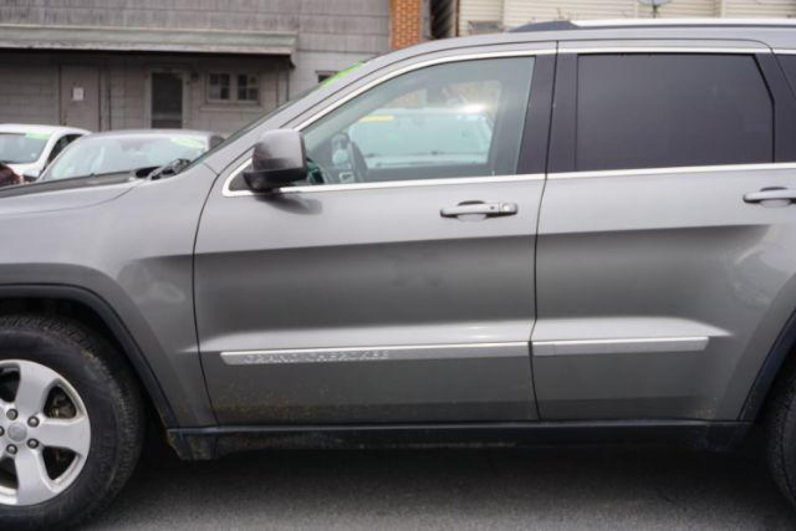 2012 Mineral Gray Metallic Clearcoat /Medium Graystone/Dark Graystone Jeep Grand Cherokee Laredo (1C4RJFAGXCC) , located at 312 Centre Ave, Schuylkill Haven, PA, 17972, (570) 593-5278, 40.638130, -76.177383 - Photo#4