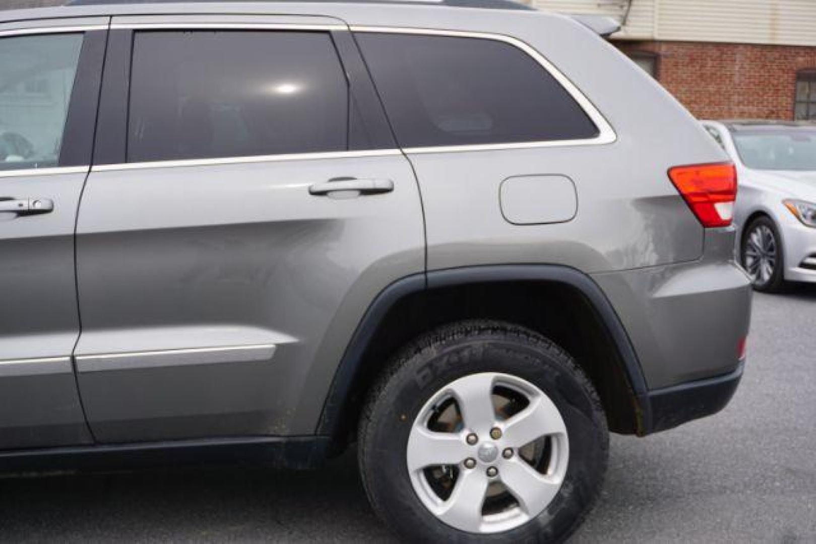 2012 Mineral Gray Metallic Clearcoat /Medium Graystone/Dark Graystone Jeep Grand Cherokee Laredo (1C4RJFAGXCC) , located at 312 Centre Ave, Schuylkill Haven, PA, 17972, (570) 593-5278, 40.638130, -76.177383 - Photo#5