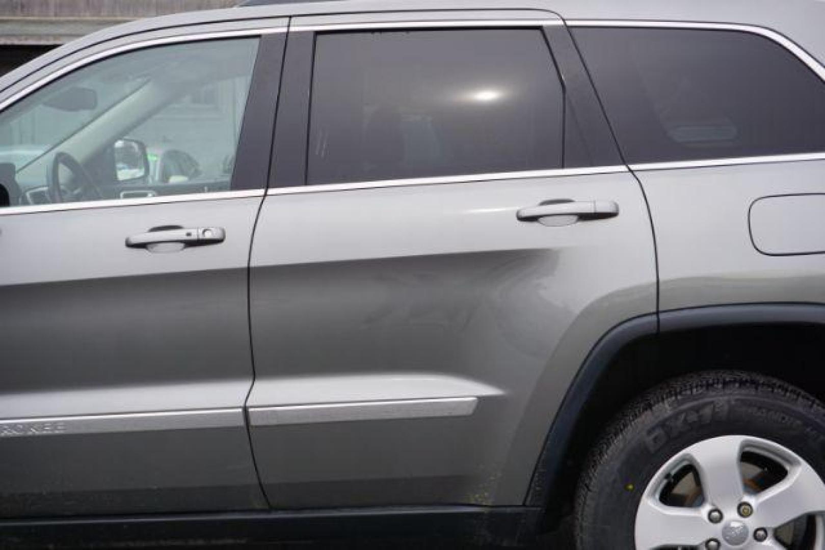 2012 Mineral Gray Metallic Clearcoat /Medium Graystone/Dark Graystone Jeep Grand Cherokee Laredo (1C4RJFAGXCC) , located at 312 Centre Ave, Schuylkill Haven, PA, 17972, (570) 593-5278, 40.638130, -76.177383 - Photo#6
