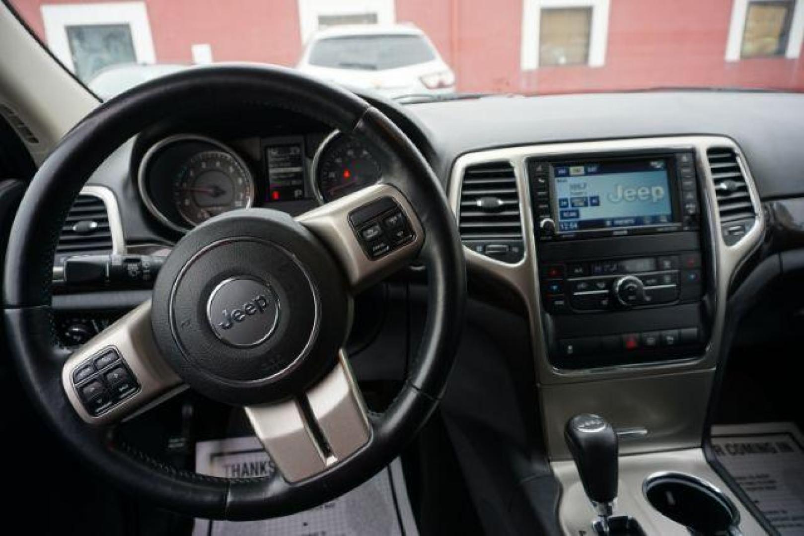 2012 Mineral Gray Metallic Clearcoat /Medium Graystone/Dark Graystone Jeep Grand Cherokee Laredo (1C4RJFAGXCC) , located at 312 Centre Ave, Schuylkill Haven, PA, 17972, (570) 593-5278, 40.638130, -76.177383 - Photo#37