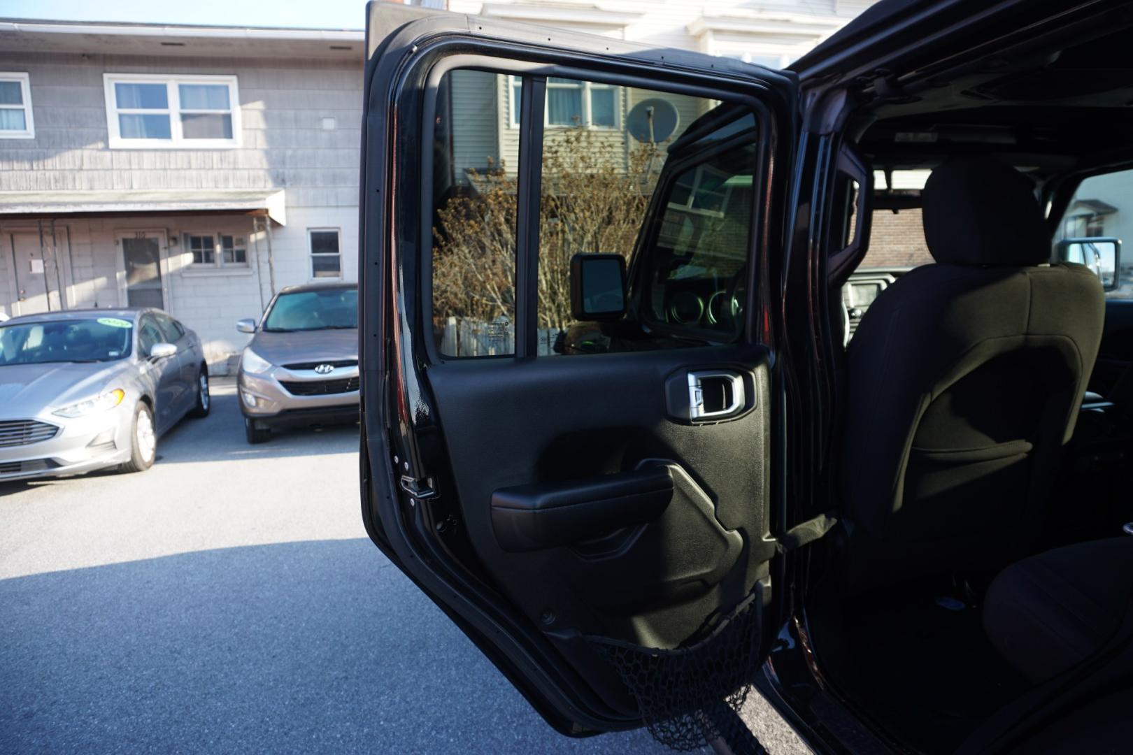 2018 BLACK CLEARCOAT JEEP WRANGLER UNLIMITED SPORT S (1C4HJXDG3JW) with an 3.6L V6 F DOHC 24V engine, AUTOMATIC transmission, located at 312 Centre Ave, Schuylkill Haven, PA, 17972, (570) 593-5278, 40.638130, -76.177383- Photo#37