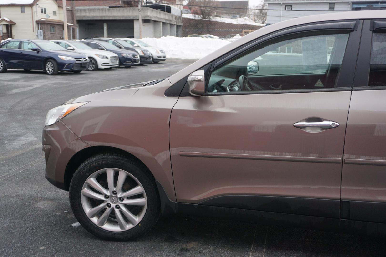 2010 Chai Bronze Metallic HYUNDAI TUCSON LIMITED (KM8JUCAC1AU) with an 2.4L L4 DOHC 16V engine, 6-Speed Automatic transmission, located at 312 Centre Ave, Schuylkill Haven, PA, 17972, (570) 593-5278, 40.638130, -76.177383 - Photo#1