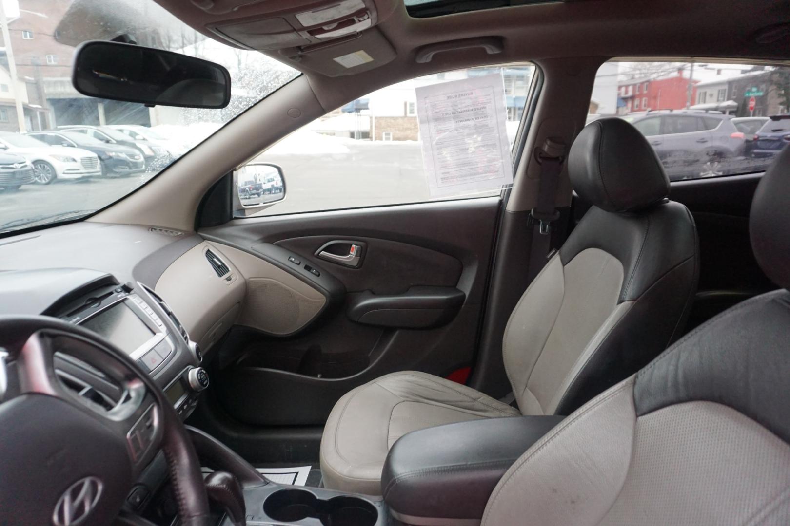 2010 Chai Bronze Metallic HYUNDAI TUCSON LIMITED (KM8JUCAC1AU) with an 2.4L L4 DOHC 16V engine, 6-Speed Automatic transmission, located at 312 Centre Ave, Schuylkill Haven, PA, 17972, (570) 593-5278, 40.638130, -76.177383 - Photo#28