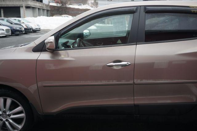 2010 Chai Bronze Metallic Hyundai Tucson Limited 4WD (KM8JUCAC1AU) with an 2.4L L4 DOHC 16V engine, 6-Speed Automatic transmission, located at 312 Centre Ave, Schuylkill Haven, PA, 17972, (570) 593-5278, 40.638130, -76.177383 - Photo#4