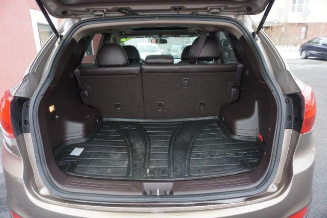 2010 Chai Bronze Metallic Hyundai Tucson Limited 4WD (KM8JUCAC1AU) with an 2.4L L4 DOHC 16V engine, 6-Speed Automatic transmission, located at 312 Centre Ave, Schuylkill Haven, PA, 17972, (570) 593-5278, 40.638130, -76.177383 - Photo#12