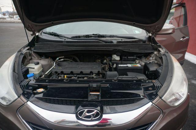 2010 Chai Bronze Metallic Hyundai Tucson Limited 4WD (KM8JUCAC1AU) with an 2.4L L4 DOHC 16V engine, 6-Speed Automatic transmission, located at 312 Centre Ave, Schuylkill Haven, PA, 17972, (570) 593-5278, 40.638130, -76.177383 - Photo#26