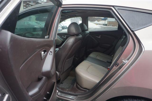 2010 Chai Bronze Metallic Hyundai Tucson Limited 4WD (KM8JUCAC1AU) with an 2.4L L4 DOHC 16V engine, 6-Speed Automatic transmission, located at 312 Centre Ave, Schuylkill Haven, PA, 17972, (570) 593-5278, 40.638130, -76.177383 - Photo#36