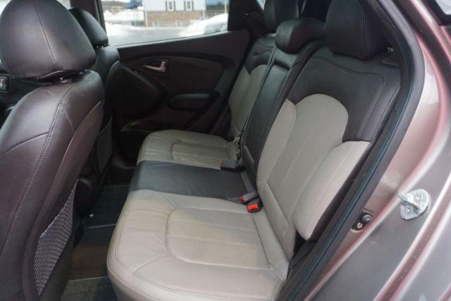 2010 Chai Bronze Metallic Hyundai Tucson Limited 4WD (KM8JUCAC1AU) with an 2.4L L4 DOHC 16V engine, 6-Speed Automatic transmission, located at 312 Centre Ave, Schuylkill Haven, PA, 17972, (570) 593-5278, 40.638130, -76.177383 - Photo#38