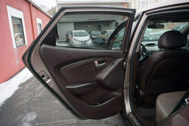 2010 Chai Bronze Metallic Hyundai Tucson Limited 4WD (KM8JUCAC1AU) with an 2.4L L4 DOHC 16V engine, 6-Speed Automatic transmission, located at 312 Centre Ave, Schuylkill Haven, PA, 17972, (570) 593-5278, 40.638130, -76.177383 - Photo#42