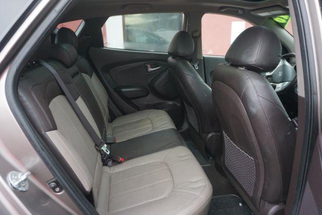 2010 Chai Bronze Metallic Hyundai Tucson Limited 4WD (KM8JUCAC1AU) with an 2.4L L4 DOHC 16V engine, 6-Speed Automatic transmission, located at 312 Centre Ave, Schuylkill Haven, PA, 17972, (570) 593-5278, 40.638130, -76.177383 - Photo#44