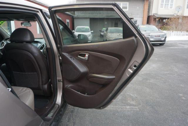 2010 Chai Bronze Metallic Hyundai Tucson Limited 4WD (KM8JUCAC1AU) with an 2.4L L4 DOHC 16V engine, 6-Speed Automatic transmission, located at 312 Centre Ave, Schuylkill Haven, PA, 17972, (570) 593-5278, 40.638130, -76.177383 - Photo#48