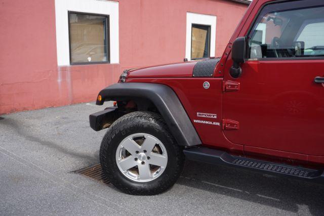 2013 Flame Red Clearcoat /Black Jeep Wrangler Sport (1C4AJWAG3DL) with an 3.6L V-6 DOHC engine, located at 312 Centre Ave, Schuylkill Haven, PA, 17972, (570) 593-5278, 40.638130, -76.177383 - Photo#2