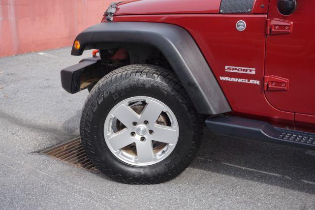 2013 Flame Red Clearcoat /Black Jeep Wrangler Sport (1C4AJWAG3DL) with an 3.6L V-6 DOHC engine, located at 312 Centre Ave, Schuylkill Haven, PA, 17972, (570) 593-5278, 40.638130, -76.177383 - Photo#3