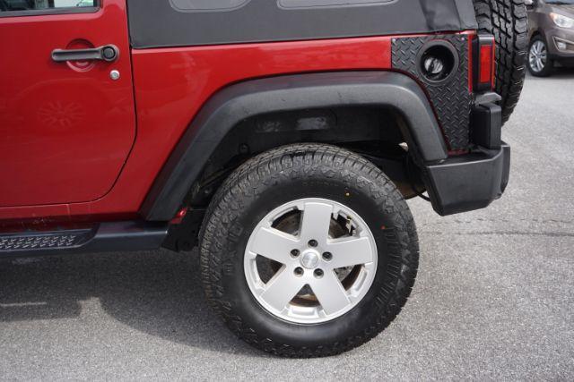 2013 Flame Red Clearcoat /Black Jeep Wrangler Sport (1C4AJWAG3DL) with an 3.6L V-6 DOHC engine, located at 312 Centre Ave, Schuylkill Haven, PA, 17972, (570) 593-5278, 40.638130, -76.177383 - Photo#5
