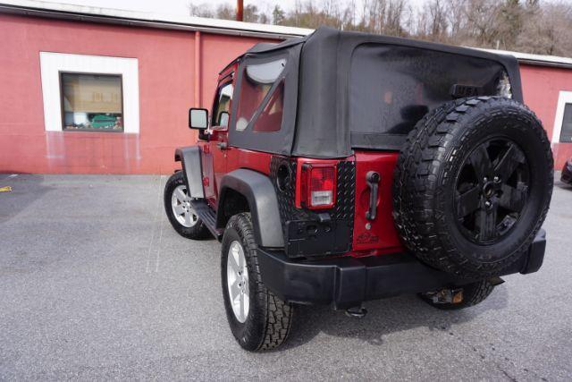 2013 Flame Red Clearcoat /Black Jeep Wrangler Sport (1C4AJWAG3DL) with an 3.6L V-6 DOHC engine, located at 312 Centre Ave, Schuylkill Haven, PA, 17972, (570) 593-5278, 40.638130, -76.177383 - Photo#6