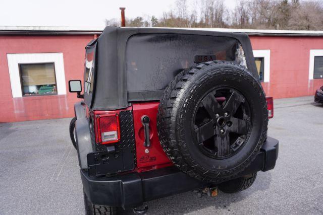 2013 Flame Red Clearcoat /Black Jeep Wrangler Sport (1C4AJWAG3DL) with an 3.6L V-6 DOHC engine, located at 312 Centre Ave, Schuylkill Haven, PA, 17972, (570) 593-5278, 40.638130, -76.177383 - Photo#7