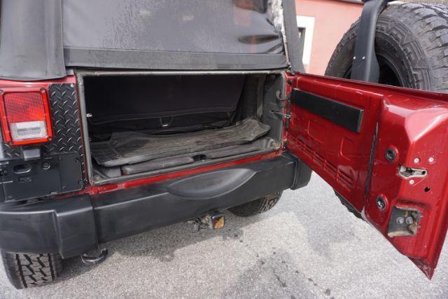 2013 Flame Red Clearcoat /Black Jeep Wrangler Sport (1C4AJWAG3DL) with an 3.6L V-6 DOHC engine, located at 312 Centre Ave, Schuylkill Haven, PA, 17972, (570) 593-5278, 40.638130, -76.177383 - Photo#8