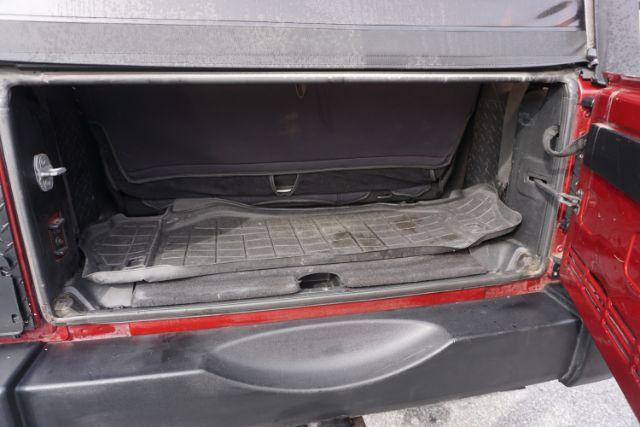 2013 Flame Red Clearcoat /Black Jeep Wrangler Sport (1C4AJWAG3DL) with an 3.6L V-6 DOHC engine, located at 312 Centre Ave, Schuylkill Haven, PA, 17972, (570) 593-5278, 40.638130, -76.177383 - Photo#9