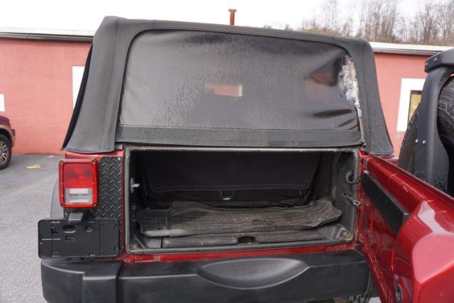 2013 Flame Red Clearcoat /Black Jeep Wrangler Sport (1C4AJWAG3DL) with an 3.6L V-6 DOHC engine, located at 312 Centre Ave, Schuylkill Haven, PA, 17972, (570) 593-5278, 40.638130, -76.177383 - Photo#10