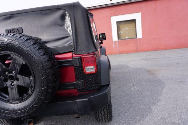 2013 Flame Red Clearcoat /Black Jeep Wrangler Sport (1C4AJWAG3DL) with an 3.6L V-6 DOHC engine, located at 312 Centre Ave, Schuylkill Haven, PA, 17972, (570) 593-5278, 40.638130, -76.177383 - Photo#11
