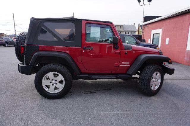 2013 Flame Red Clearcoat /Black Jeep Wrangler Sport (1C4AJWAG3DL) with an 3.6L V-6 DOHC engine, located at 312 Centre Ave, Schuylkill Haven, PA, 17972, (570) 593-5278, 40.638130, -76.177383 - Photo#13