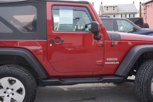 2013 Flame Red Clearcoat /Black Jeep Wrangler Sport (1C4AJWAG3DL) with an 3.6L V-6 DOHC engine, located at 312 Centre Ave, Schuylkill Haven, PA, 17972, (570) 593-5278, 40.638130, -76.177383 - Photo#17