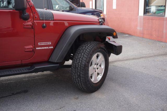 2013 Flame Red Clearcoat /Black Jeep Wrangler Sport (1C4AJWAG3DL) with an 3.6L V-6 DOHC engine, located at 312 Centre Ave, Schuylkill Haven, PA, 17972, (570) 593-5278, 40.638130, -76.177383 - Photo#18
