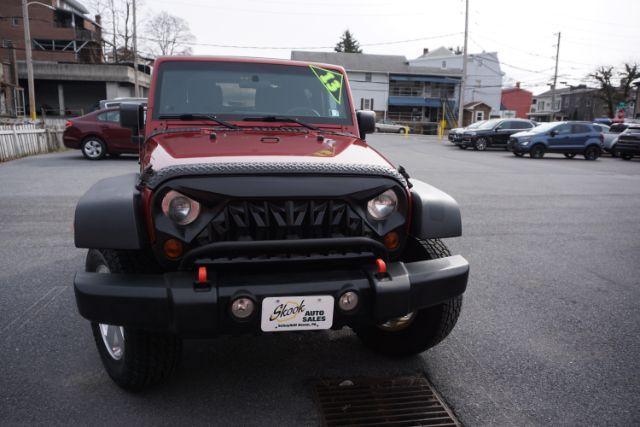 2013 Flame Red Clearcoat /Black Jeep Wrangler Sport (1C4AJWAG3DL) with an 3.6L V-6 DOHC engine, located at 312 Centre Ave, Schuylkill Haven, PA, 17972, (570) 593-5278, 40.638130, -76.177383 - Photo#20