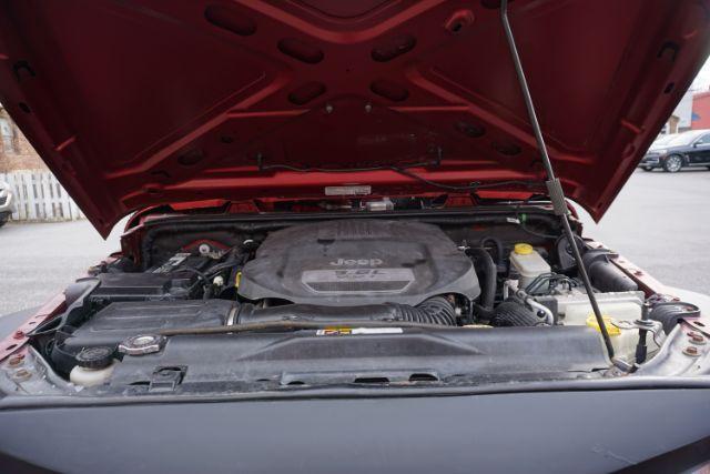 2013 Flame Red Clearcoat /Black Jeep Wrangler Sport (1C4AJWAG3DL) with an 3.6L V-6 DOHC engine, located at 312 Centre Ave, Schuylkill Haven, PA, 17972, (570) 593-5278, 40.638130, -76.177383 - Photo#22