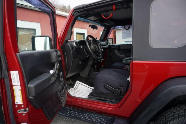 2013 Flame Red Clearcoat /Black Jeep Wrangler Sport (1C4AJWAG3DL) with an 3.6L V-6 DOHC engine, located at 312 Centre Ave, Schuylkill Haven, PA, 17972, (570) 593-5278, 40.638130, -76.177383 - Photo#23