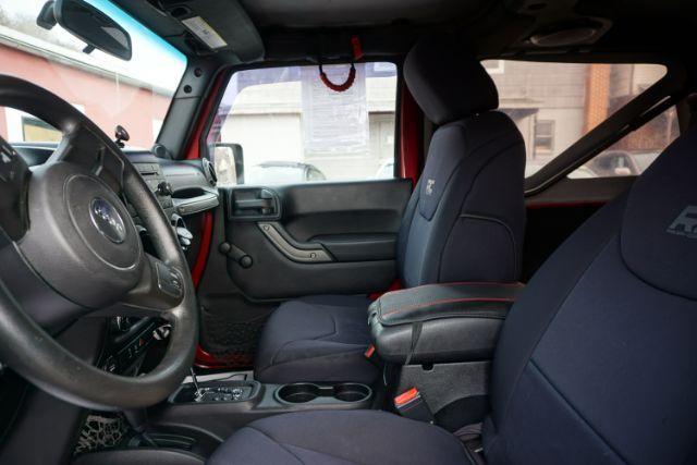 2013 Flame Red Clearcoat /Black Jeep Wrangler Sport (1C4AJWAG3DL) with an 3.6L V-6 DOHC engine, located at 312 Centre Ave, Schuylkill Haven, PA, 17972, (570) 593-5278, 40.638130, -76.177383 - Photo#24