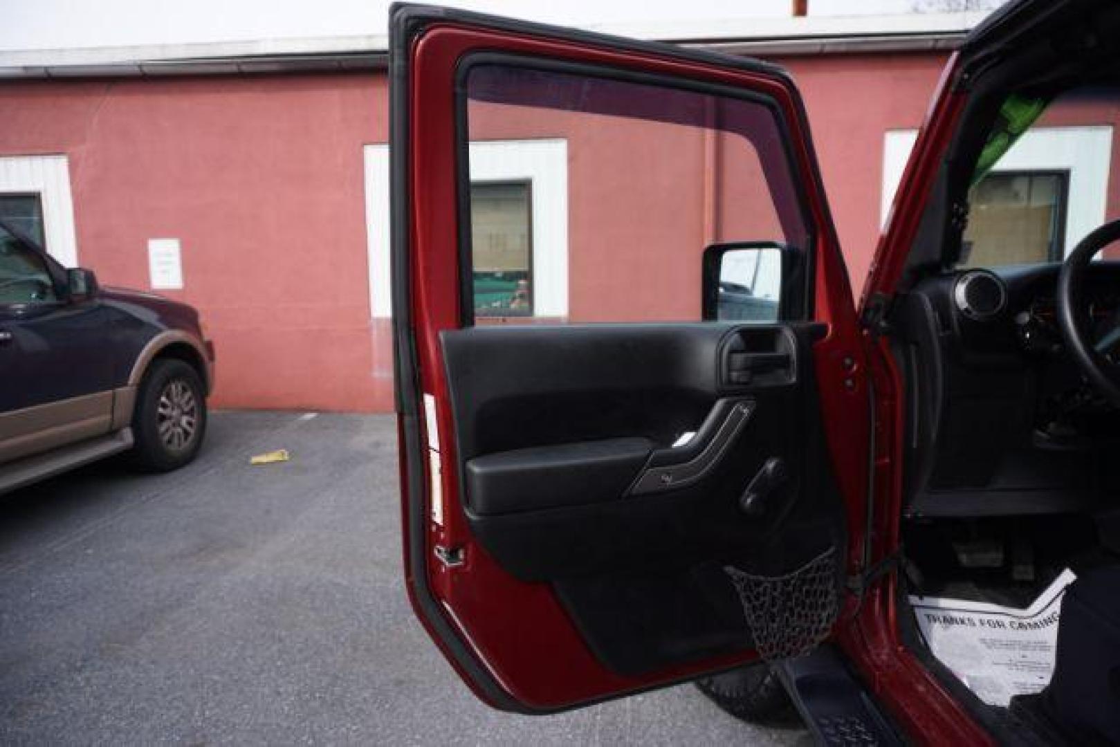 2013 Flame Red Clearcoat /Black Jeep Wrangler Sport (1C4AJWAG3DL) with an 3.6L V-6 DOHC engine, located at 312 Centre Ave, Schuylkill Haven, PA, 17972, (570) 593-5278, 40.638130, -76.177383 - Photo#33