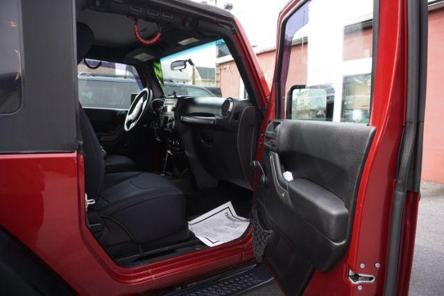 2013 Flame Red Clearcoat /Black Jeep Wrangler Sport (1C4AJWAG3DL) with an 3.6L V-6 DOHC engine, located at 312 Centre Ave, Schuylkill Haven, PA, 17972, (570) 593-5278, 40.638130, -76.177383 - Photo#34