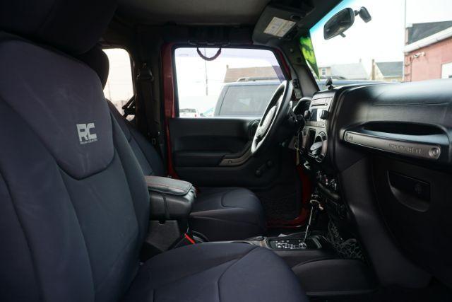 2013 Flame Red Clearcoat /Black Jeep Wrangler Sport (1C4AJWAG3DL) with an 3.6L V-6 DOHC engine, located at 312 Centre Ave, Schuylkill Haven, PA, 17972, (570) 593-5278, 40.638130, -76.177383 - Photo#35