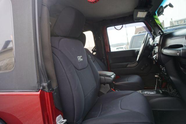 2013 Flame Red Clearcoat /Black Jeep Wrangler Sport (1C4AJWAG3DL) with an 3.6L V-6 DOHC engine, located at 312 Centre Ave, Schuylkill Haven, PA, 17972, (570) 593-5278, 40.638130, -76.177383 - Photo#37