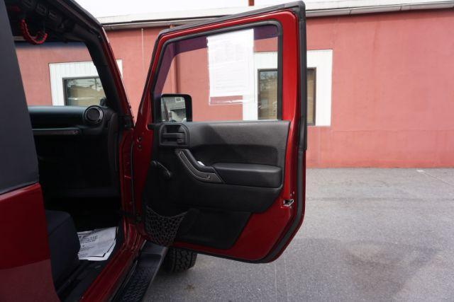 2013 Flame Red Clearcoat /Black Jeep Wrangler Sport (1C4AJWAG3DL) with an 3.6L V-6 DOHC engine, located at 312 Centre Ave, Schuylkill Haven, PA, 17972, (570) 593-5278, 40.638130, -76.177383 - Photo#38