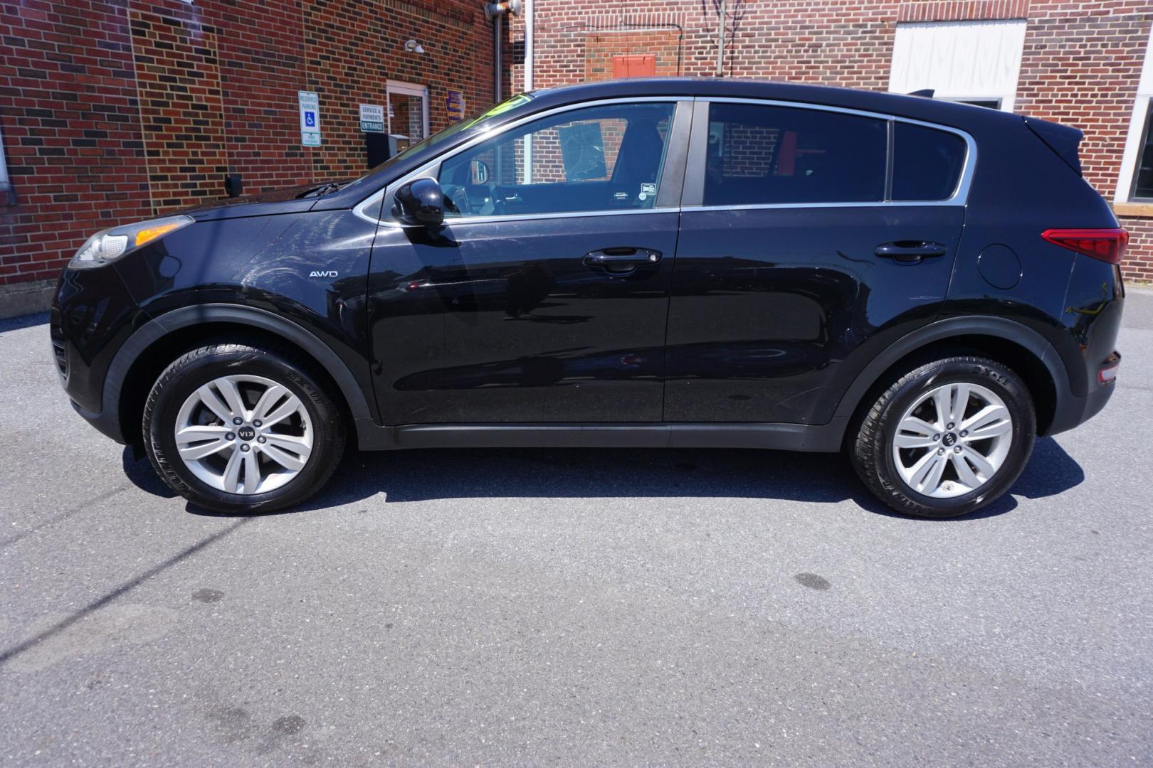 2019 BLACK CHERRY KIA SPORTAGE LX (KNDPMCAC8K7) with an 2.4L I4 engine, AUTOMATIC transmission, located at 312 Centre Ave, Schuylkill Haven, PA, 17972, (570) 593-5278, 40.638130, -76.177383- Photo#0