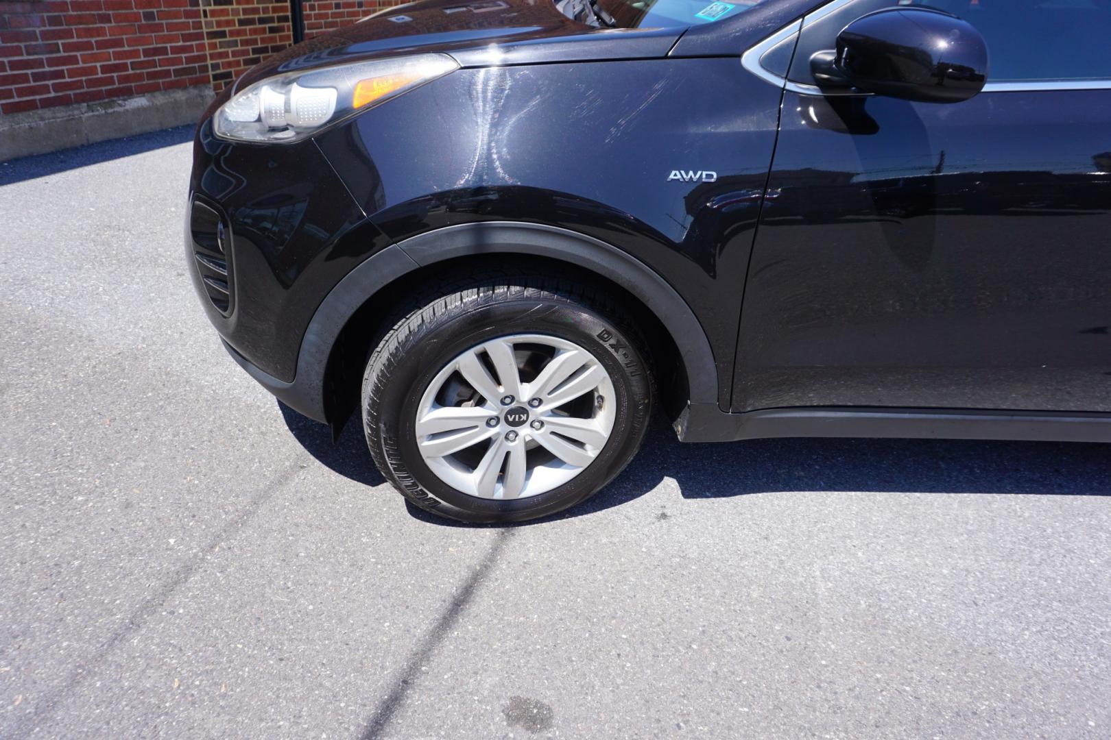 2019 BLACK CHERRY KIA SPORTAGE LX (KNDPMCAC8K7) with an 2.4L I4 engine, AUTOMATIC transmission, located at 312 Centre Ave, Schuylkill Haven, PA, 17972, (570) 593-5278, 40.638130, -76.177383- Photo#4