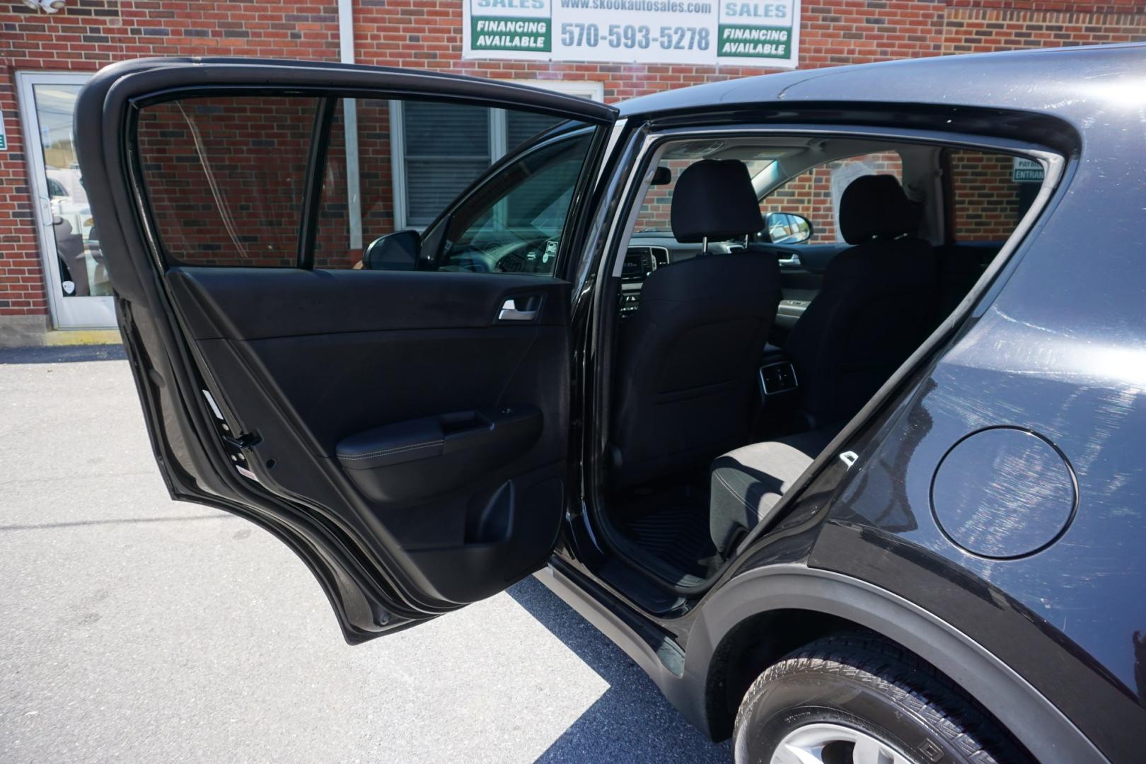 2019 BLACK CHERRY KIA SPORTAGE LX (KNDPMCAC8K7) with an 2.4L I4 engine, AUTOMATIC transmission, located at 312 Centre Ave, Schuylkill Haven, PA, 17972, (570) 593-5278, 40.638130, -76.177383- Photo#29