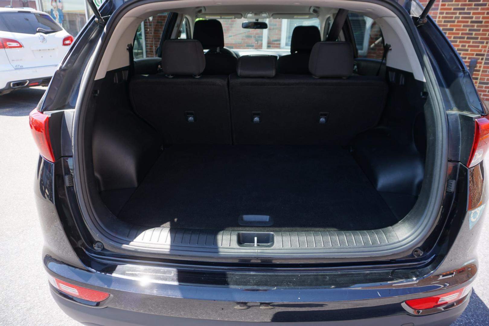 2019 BLACK CHERRY KIA SPORTAGE LX (KNDPMCAC8K7) with an 2.4L I4 engine, AUTOMATIC transmission, located at 312 Centre Ave, Schuylkill Haven, PA, 17972, (570) 593-5278, 40.638130, -76.177383- Photo#31