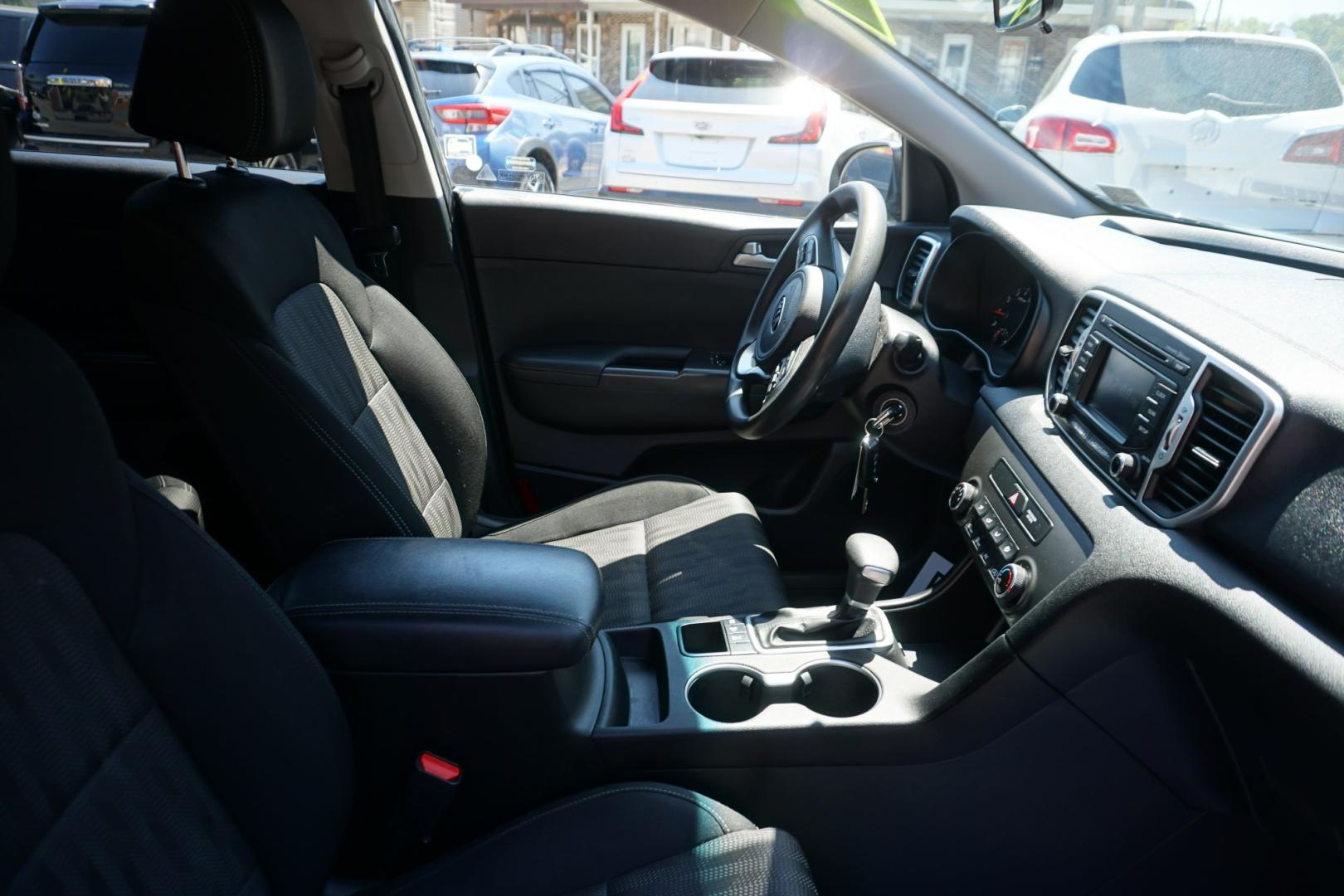 2019 BLACK CHERRY KIA SPORTAGE LX (KNDPMCAC8K7) with an 2.4L I4 engine, AUTOMATIC transmission, located at 312 Centre Ave, Schuylkill Haven, PA, 17972, (570) 593-5278, 40.638130, -76.177383- Photo#38