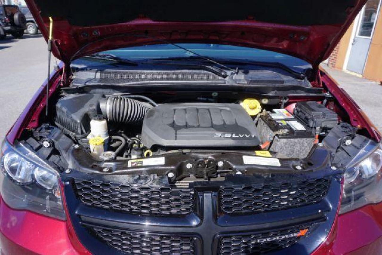 2018 Octane Red Pearlcoat /Black DODGE GRAND CARAVAN SE PLUS (2C4RDGBGXJR) with an Pentastar 3.6L V-6 DOHC engine, located at 312 Centre Ave, Schuylkill Haven, PA, 17972, (570) 593-5278, 40.638130, -76.177383- Photo#92