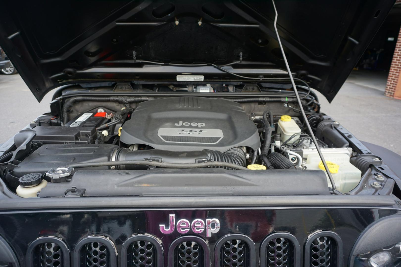 2013 BLACK /ORANGE JEEP WRANGLER SPORT (1C4BJWDG2DL) with an 3.6L V6 engine, AUTOMATIC transmission, located at 312 Centre Ave, Schuylkill Haven, PA, 17972, (570) 593-5278, 40.638130, -76.177383- Photo#16