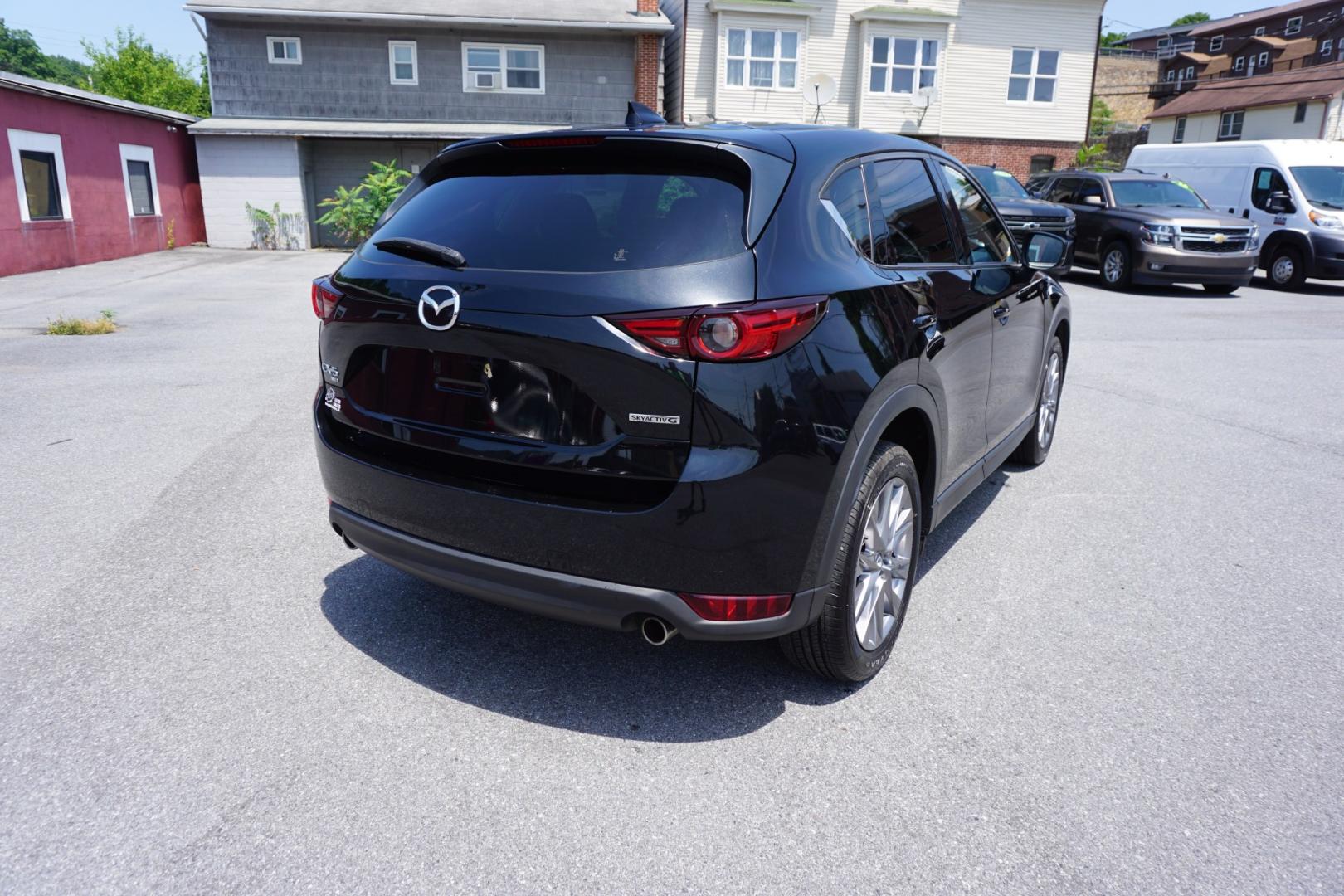 2021 BLACK /BLACK MAZDA CX-5 GRAND TOURING (JM3KFBDM1M1) with an 2.5L I4 engine, AUTOMATIC transmission, located at 312 Centre Ave, Schuylkill Haven, PA, 17972, (570) 593-5278, 40.638130, -76.177383- Photo#11