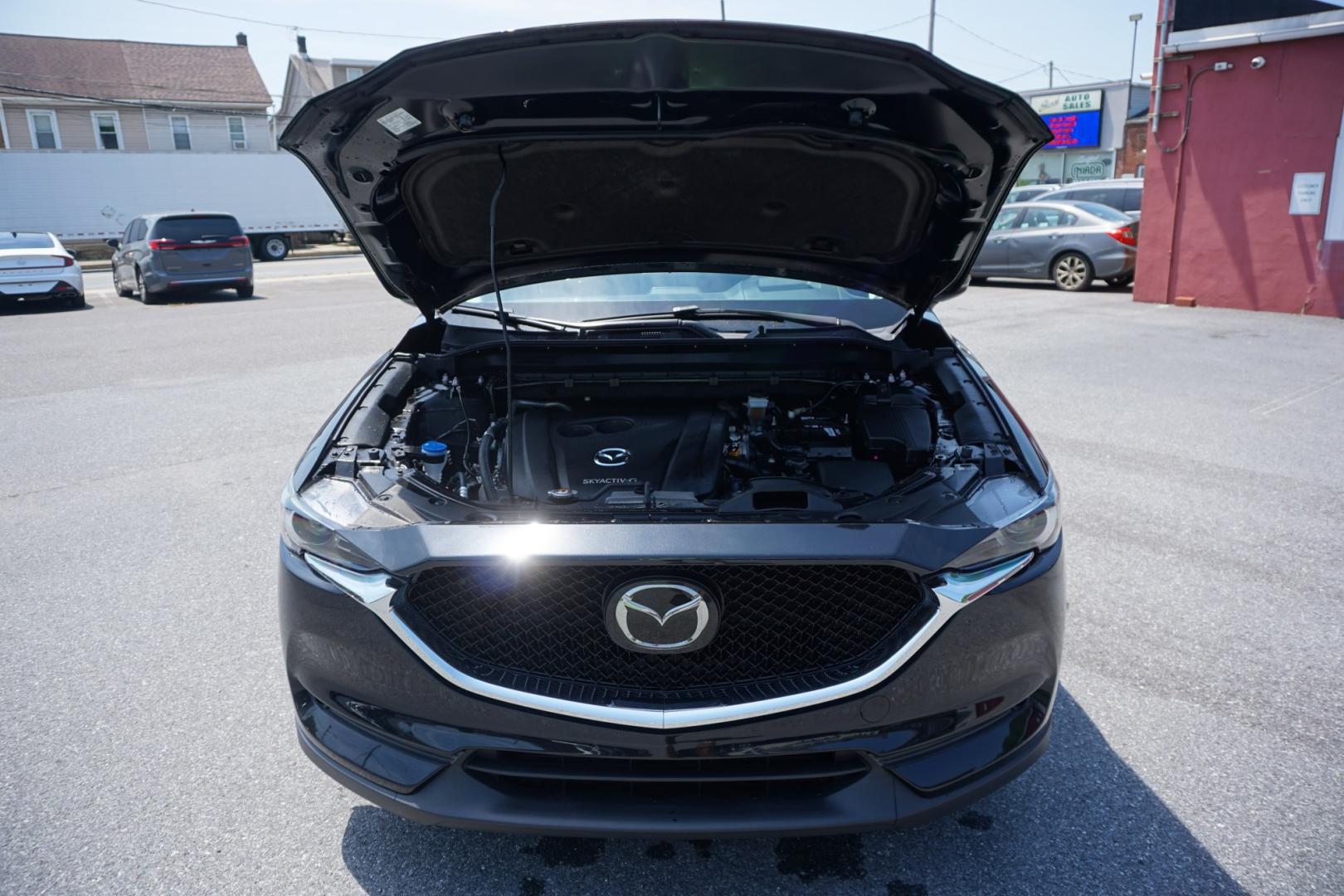 2021 BLACK /BLACK MAZDA CX-5 GRAND TOURING (JM3KFBDM1M1) with an 2.5L I4 engine, AUTOMATIC transmission, located at 312 Centre Ave, Schuylkill Haven, PA, 17972, (570) 593-5278, 40.638130, -76.177383- Photo#17