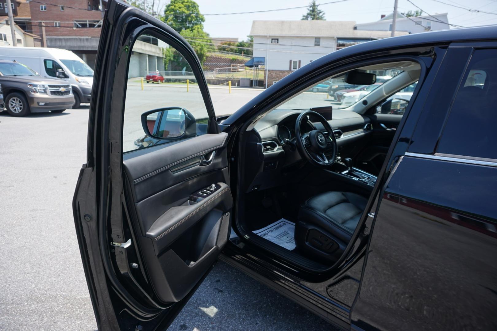 2021 BLACK /BLACK MAZDA CX-5 GRAND TOURING (JM3KFBDM1M1) with an 2.5L I4 engine, AUTOMATIC transmission, located at 312 Centre Ave, Schuylkill Haven, PA, 17972, (570) 593-5278, 40.638130, -76.177383- Photo#26